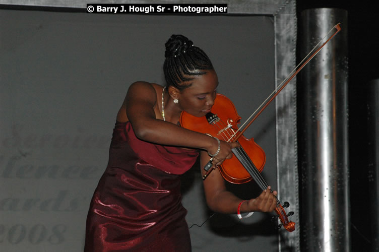 The Ministry of Tourism - Tourism Service Excellence Awards Ceremony held at the Ritz Carlton Rose Rall Golf and Spa Resort, Montego Bay on Friday, April 24, 2009 - Photographs by Net2Market.com - Barry J. Hough Sr. Photojournalist/Photograper - Photographs taken with a Nikon D300 - Negril Travel Guide, Negril Jamaica WI - http://www.negriltravelguide.com - info@negriltravelguide.com...!